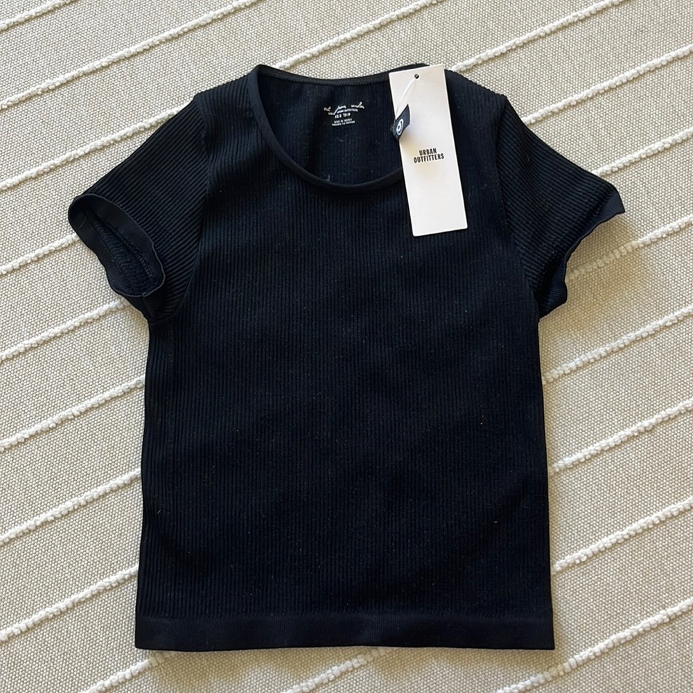 Cropped tight black crop top from urban outfitters.